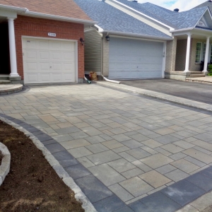 Paver Driveway Designed and Built By Alan's Landscaping and Heather's Gardens.